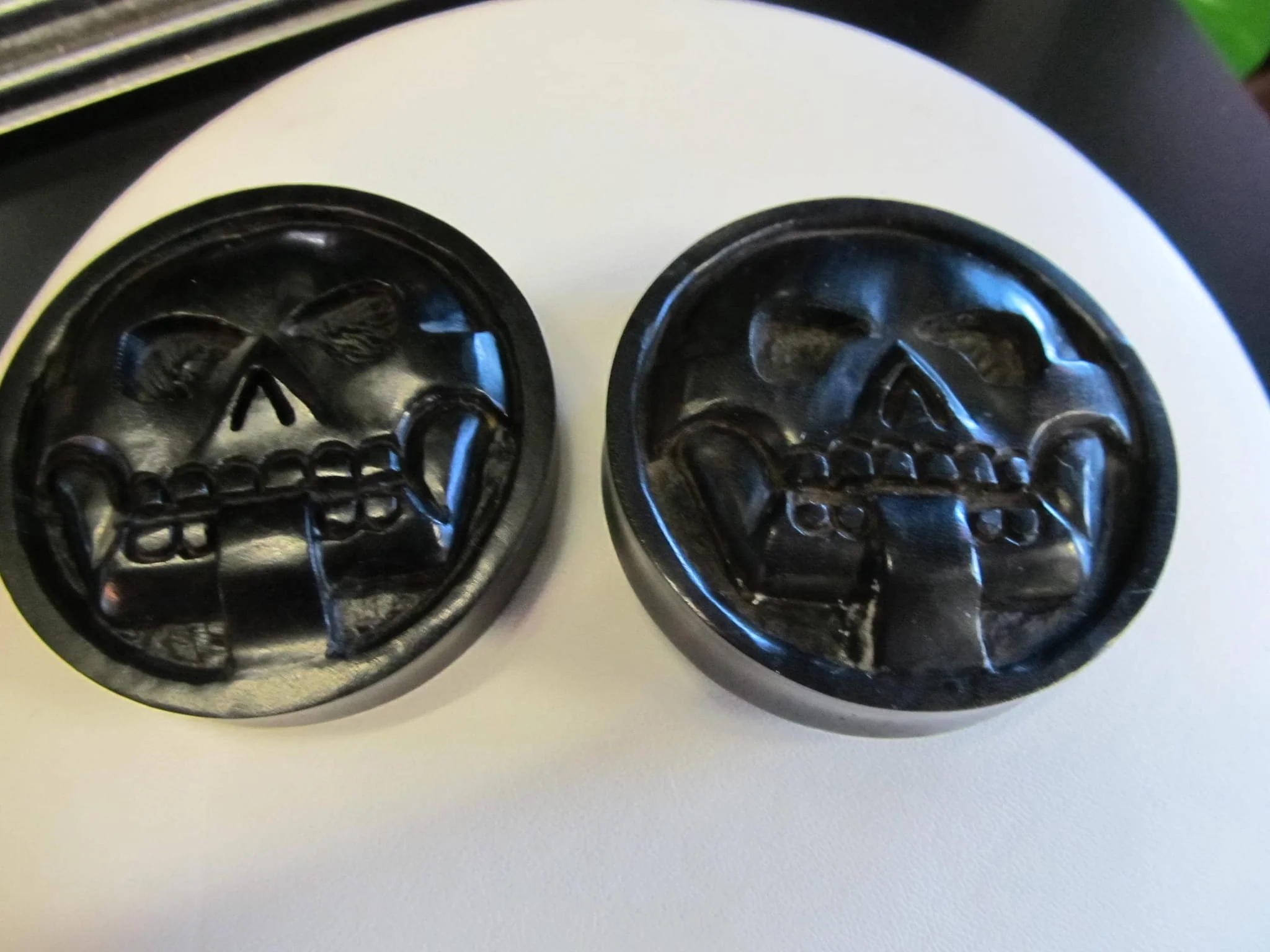 2 7/16" Ebony Carved Skull Plugs