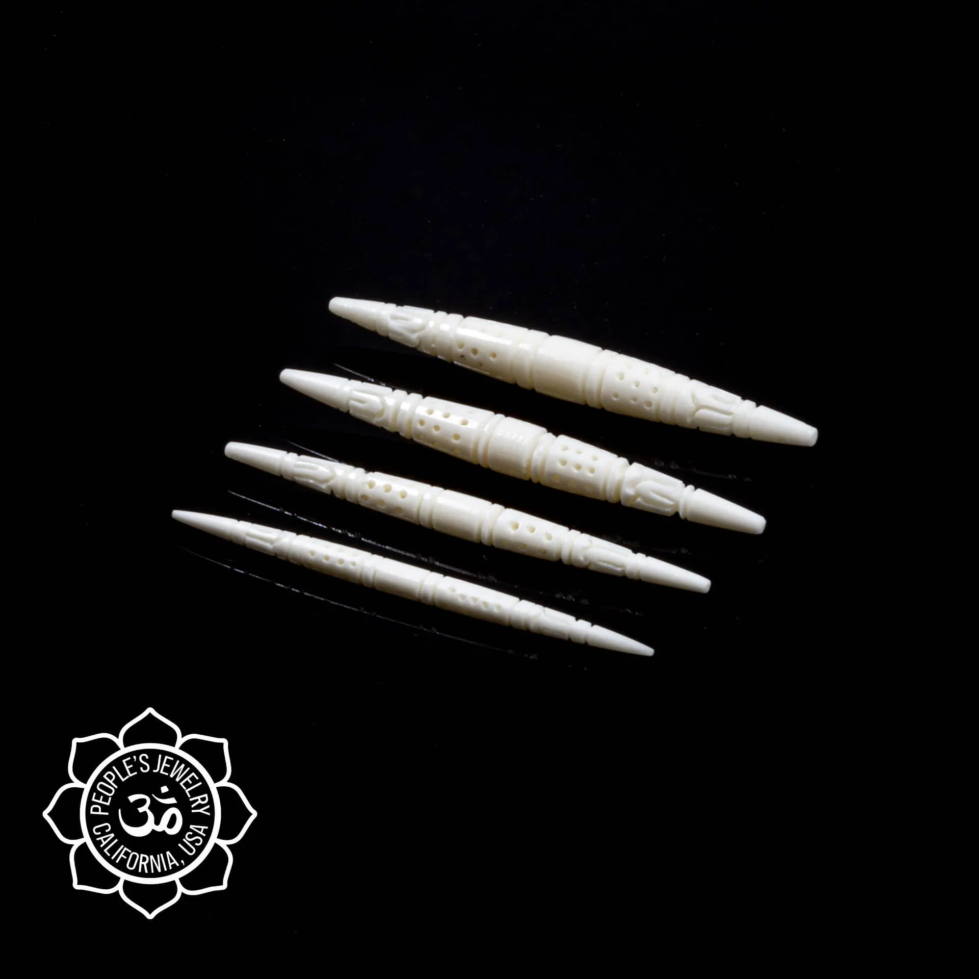 Carved Flower Horn or Bone Spikes by Peoples Jewelry