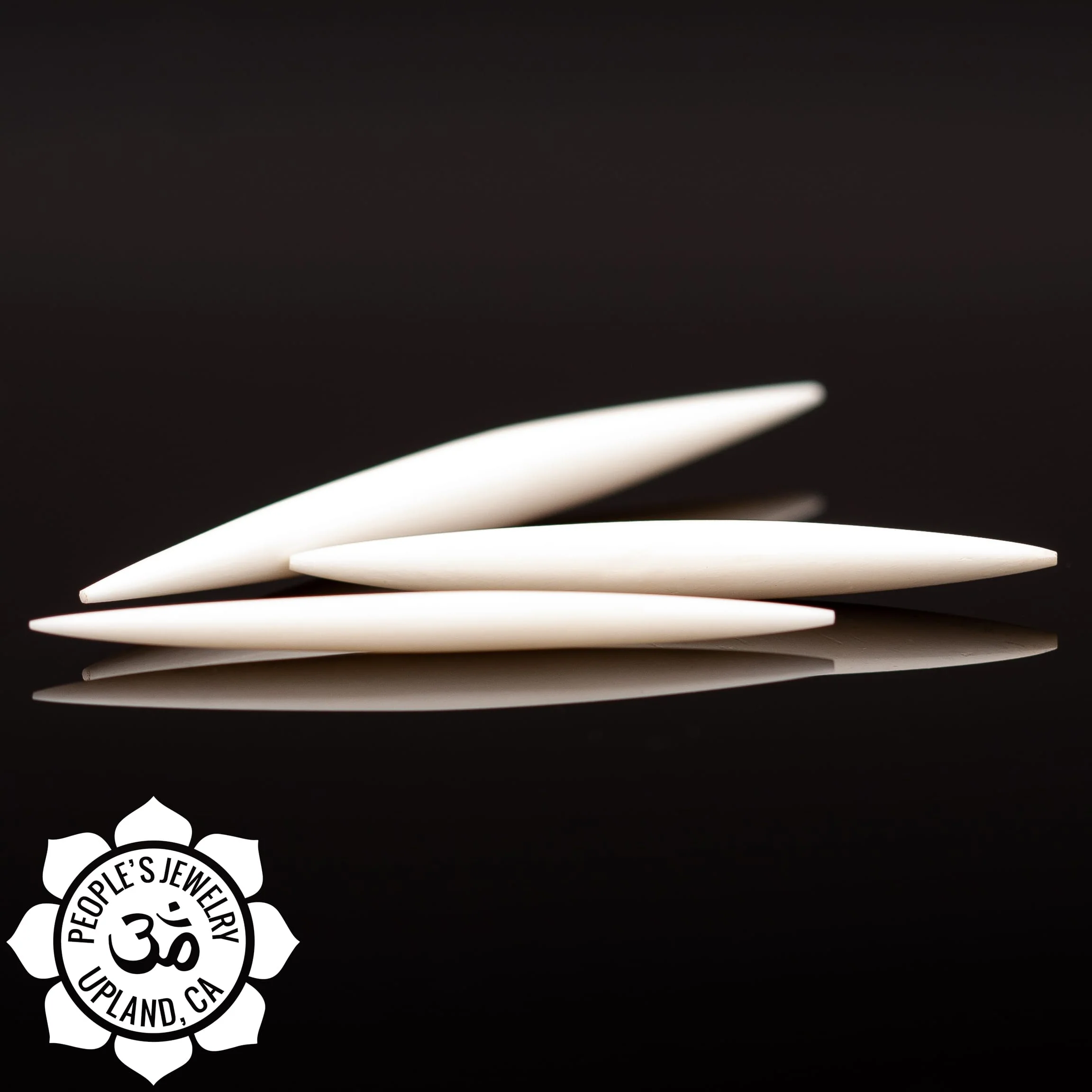 Bone Septum Spikes by Peoples Jewelry