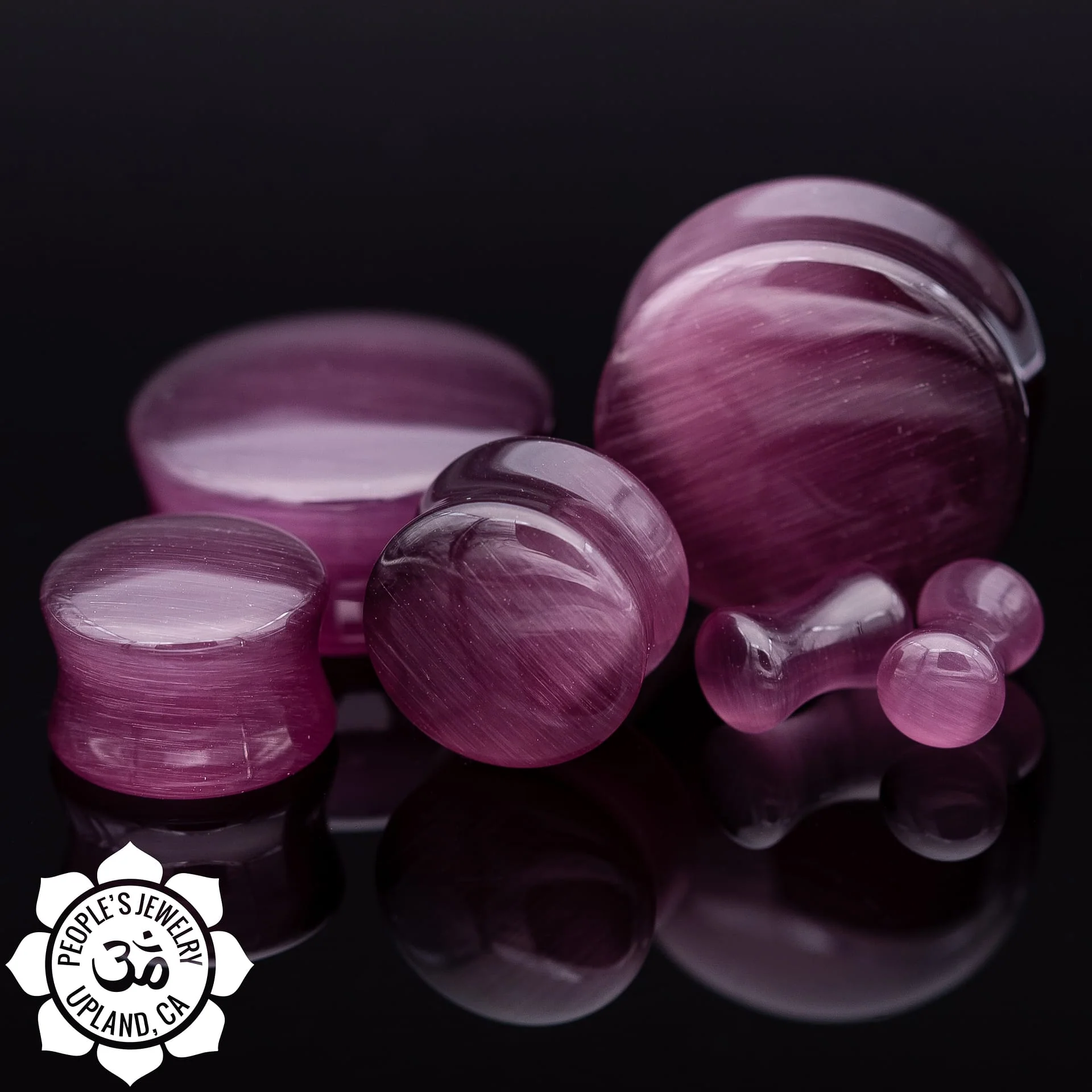 Purple Cat's Eye plugs by Peoples Jewelry